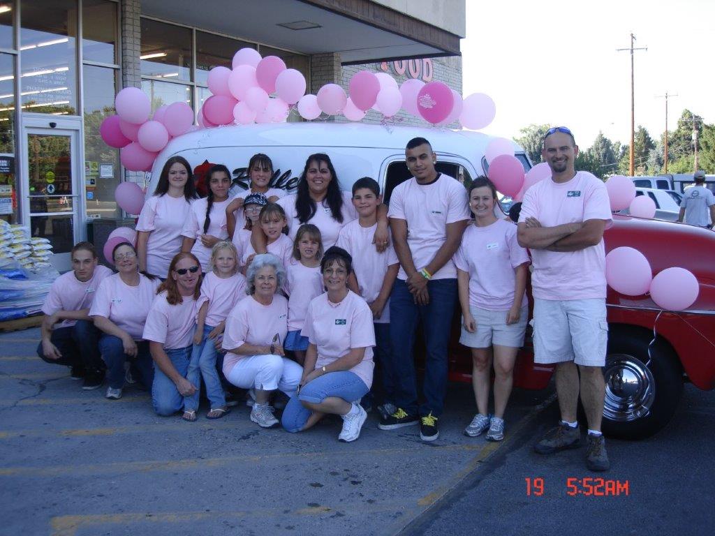 Team photo with decorated truck
